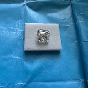 3.96 carat square emerald cut lab diamond.